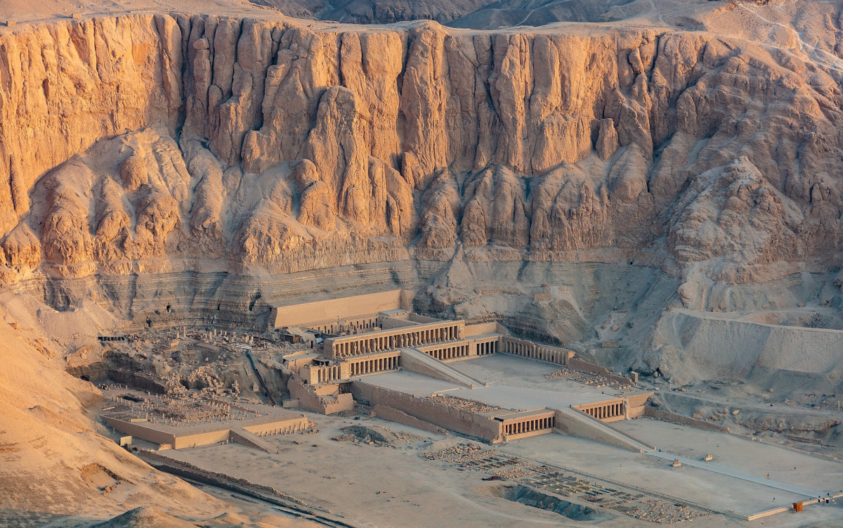 Hatshepsut temple below the cliffs of the Theban hills Hatshepsut temple below the cliffs of the Theban hills