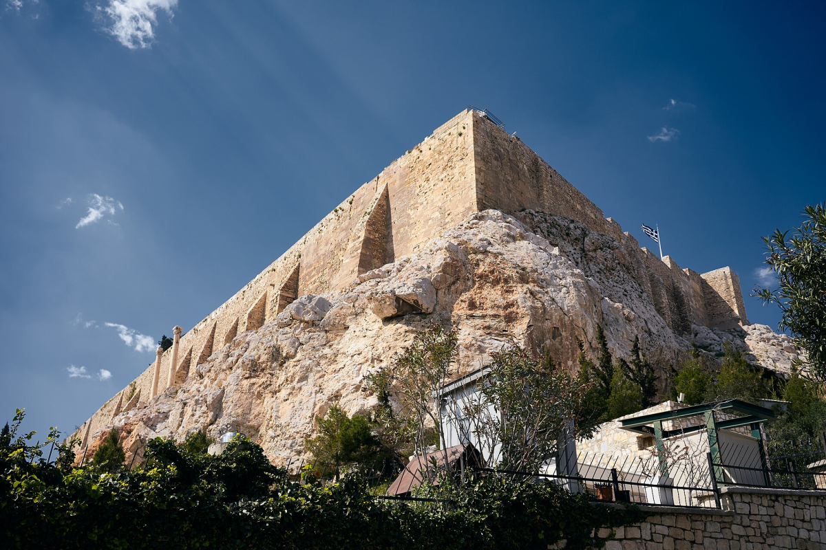 The Acropolis above Thrasyllou Street in Plaka. The Acropolis above Thrasyllou Street in Plaka.