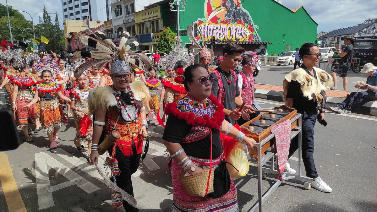 An Iban Gawai Dayak celebration parade in a historical photograph, not a current visitor programme. An Iban Gawai Dayak celebration parade in a historical photograph, not a current visitor programme.