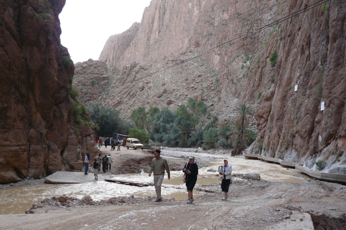 Visitors below the cliffs of Todra Gorge Visitors below the cliffs of Todra Gorge