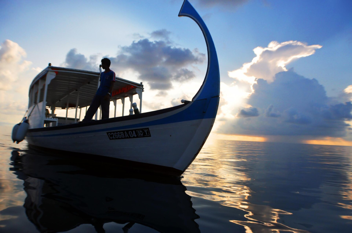 A moored dhoni in the Maldives at dusk A moored dhoni in the Maldives at dusk