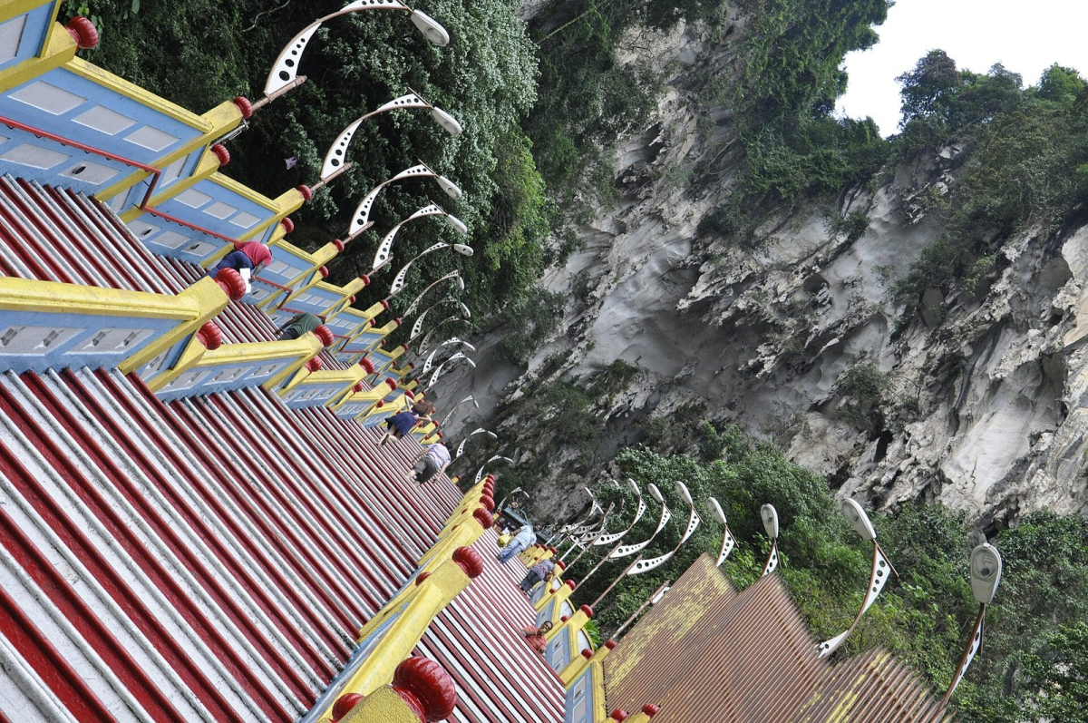 The stairway at Batu Caves; the climb involves many steps and is not a step-free route. The stairway at Batu Caves; the climb involves many steps and is not a step-free route.