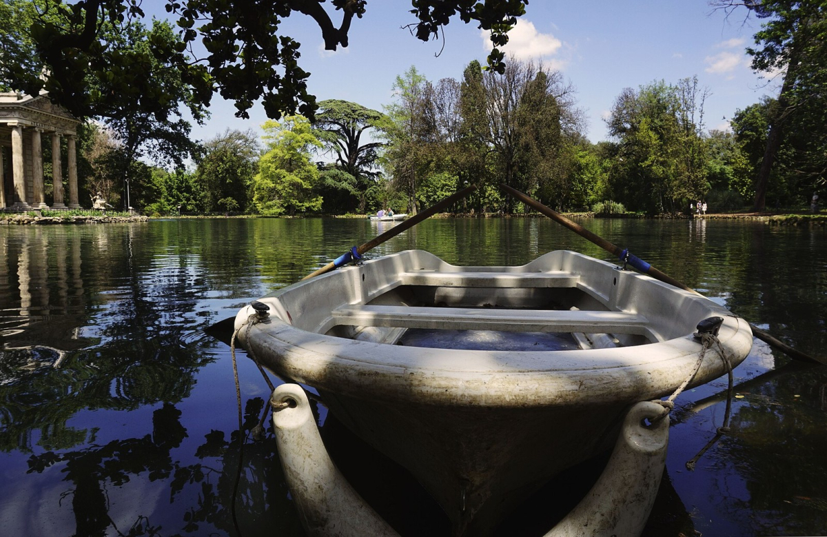 Lake and temple setting in Villa Borghese park