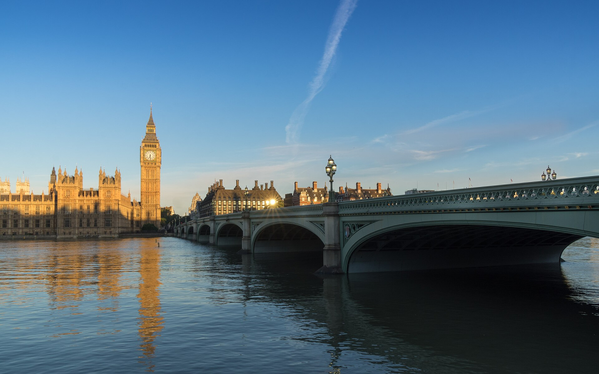Westminster Bridge and the Palace of Westminster at sunrise in 2016; light and access vary by date.