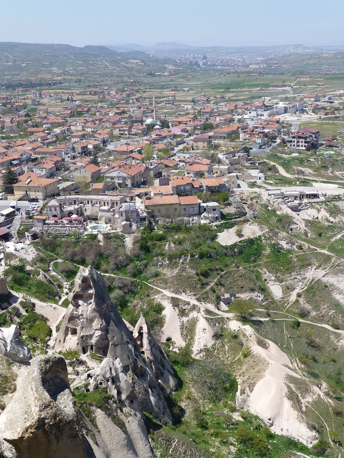 Uçhisar rooftops and surrounding Cappadocian rock formations