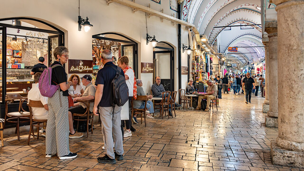 Shoppers and shops along a covered passage in Istanbul’s Grand Bazaar