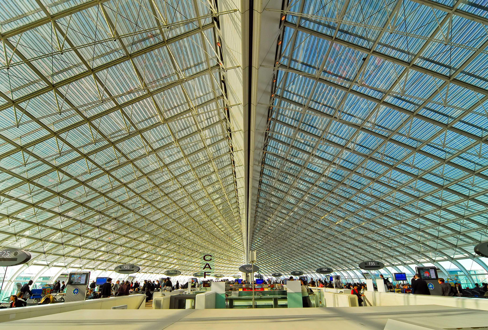 Passengers inside the departure terminal at Charles de Gaulle Airport in Paris