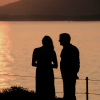 Couple watching the sunset on Naxos, one of the best Greek islands for couples