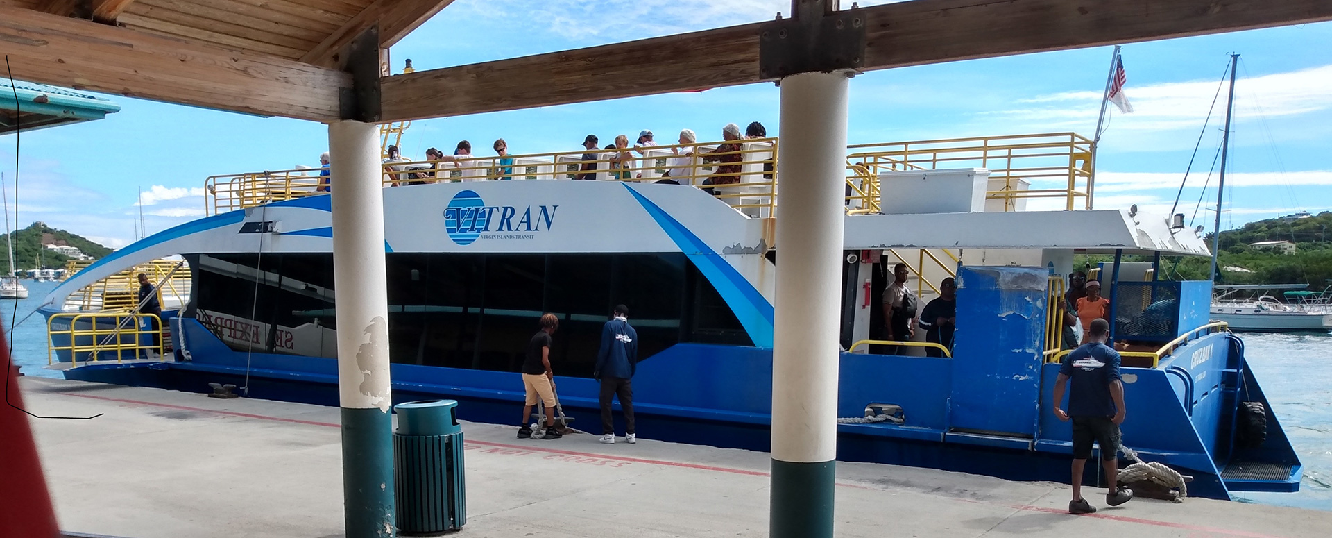 Public ferry transportation in the Virgin Islands with passengers boarding at a harbor terminal