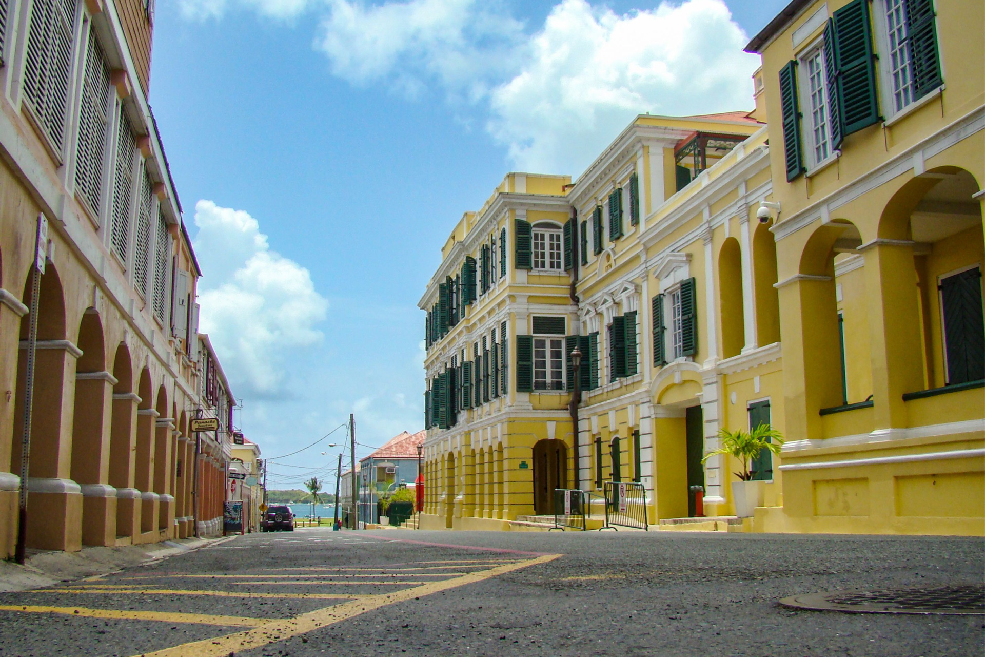 Historic walkable town street in the Virgin Islands with colonial-style buildings, reflecting daily island life and practical travel planning